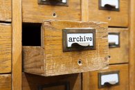 Archive system concept photo. Opened box storage, filing cabinet interior. wooden boxes with index cards. library service information management. shallow depth of field Archive system concept photo. Opened box storage, filing cabinet interior. wooden boxes with index cards. library service information management. shallow depth of field